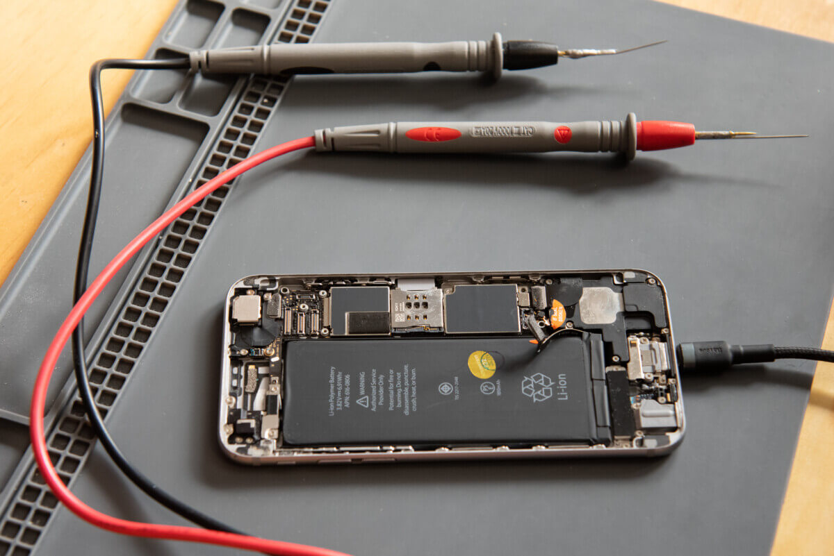 iPhone With Multimeter Probes